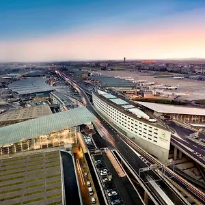 Отель Sheraton Paris Charles De Gaulle Airport Руасси-эн-Франс